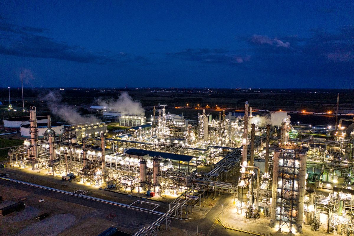 Illuminated chemical processing plant at night