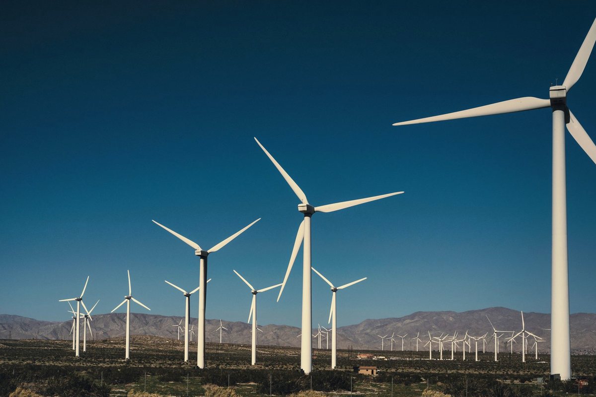 Wind turbines generating power across an open landscape